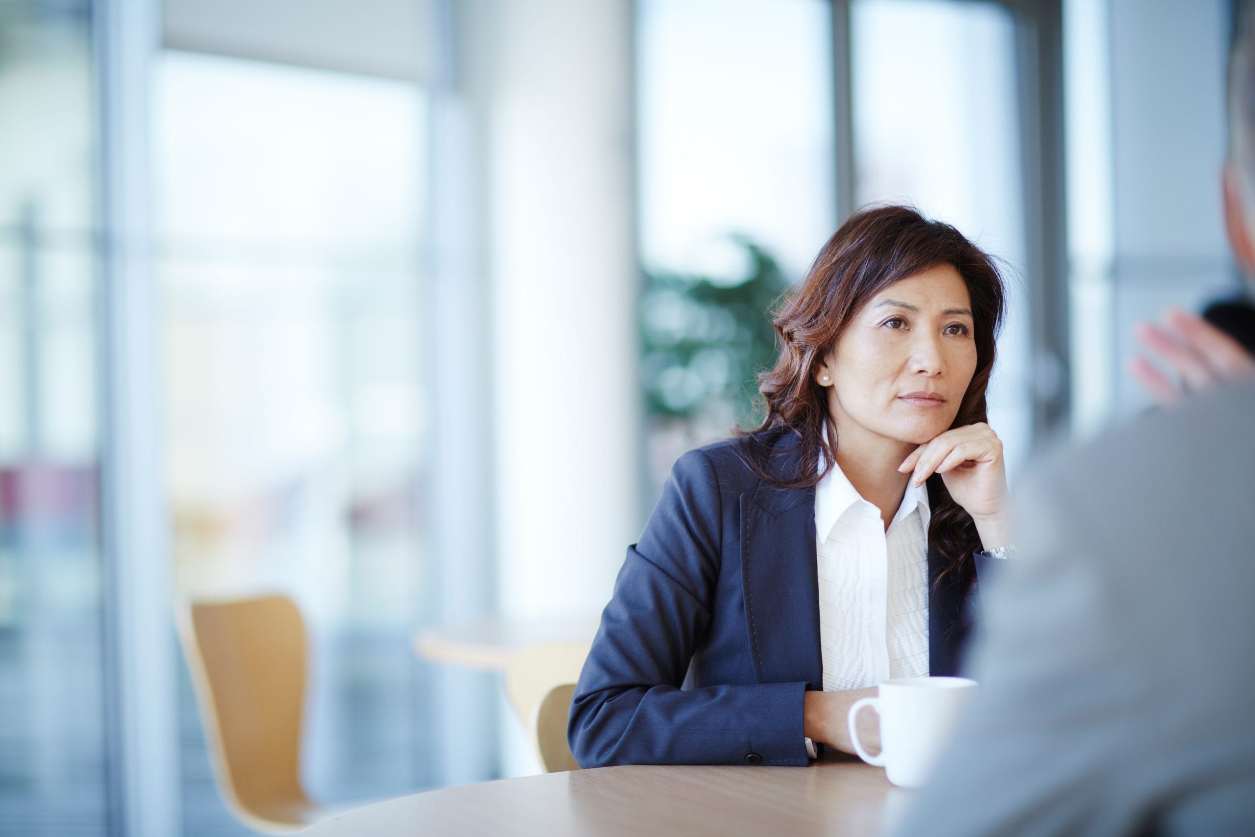 Business woman listening in a meeting