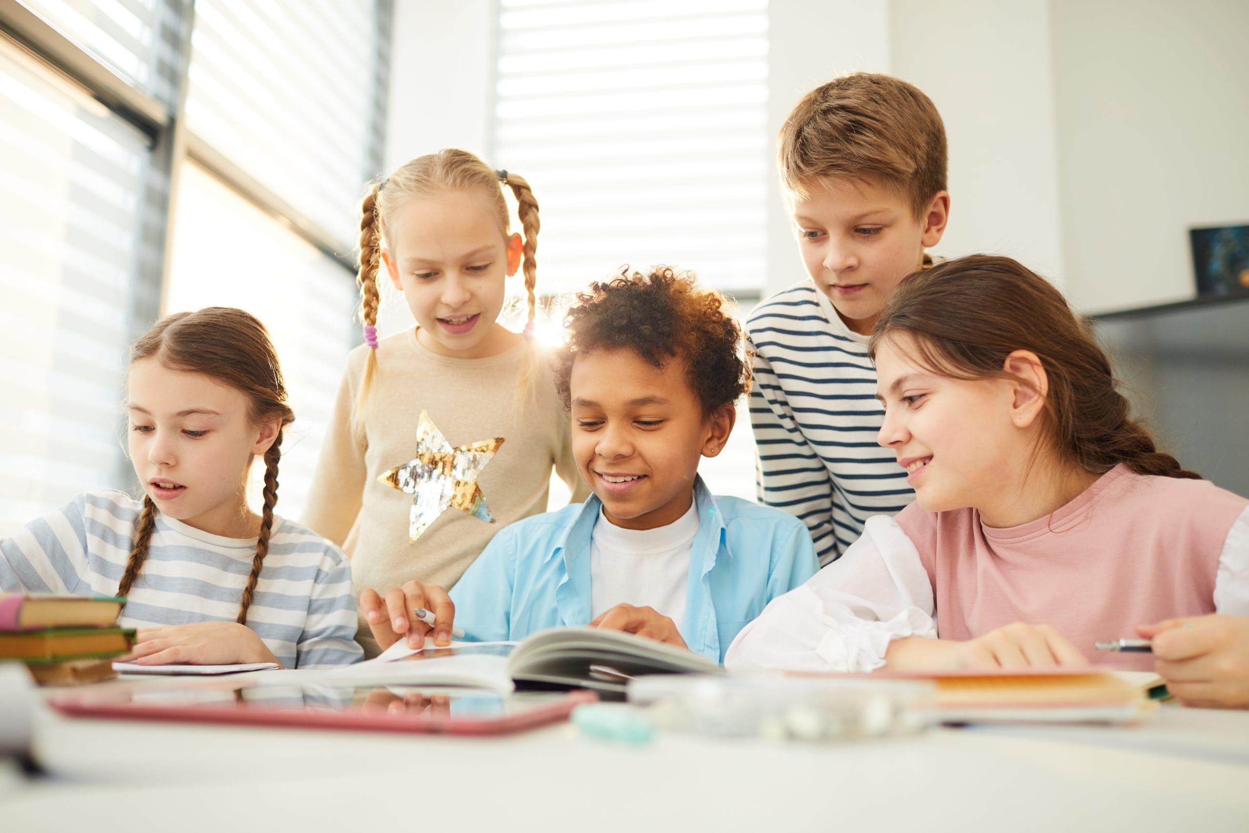 Middle school students at a table